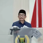 Ketua Fraksi Partai Gerindra DPRD Kabupaten Sukabumi Usep Wawan saat membacakan pandangan umum Fraksi atas Raperda APBD 2024. (Sumber : Dok. DPRD)